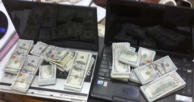 القبض على "صينى" لمحاولته تهريب 97 ألف دولار للخارج