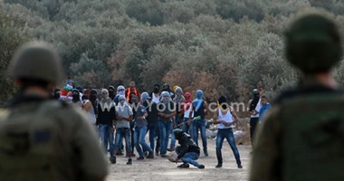 إصابة فلسطينيين فى مواجهات مع قوات الاحتلال الإسرائيلى بالبيرة والخليل