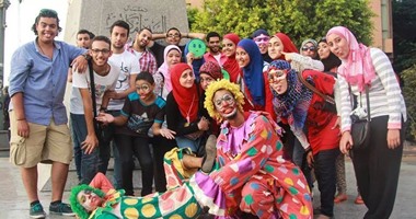 "هسهس" فريق شبابى يتواصل مع الشارع بشعار "ابتسم"