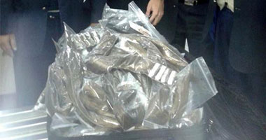 ضبط 190 قرصا مخدرا داخل برطمان سمن بلدى بالمطار