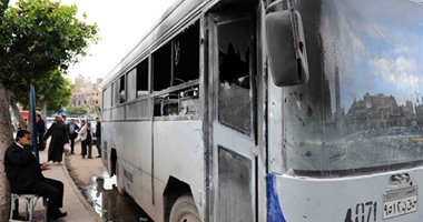 السيطرة على حريق بأتوبيس شركة على طريق المحور بلا إصابات