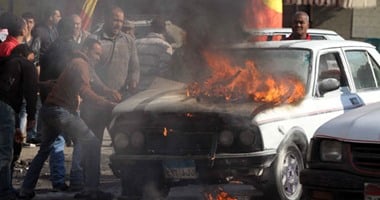 تفحم سيارة ملاكى بعد اشتعال النيران بها فى المهندسين