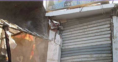 بالصور.. محافظة القاهرة تغلق المحلات المخالفة أسفل كوبرى عبود والجندول