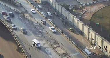 بالصور.. "المرور" تواصل أعمال تطوير كوبرى الجيزة المعدنى