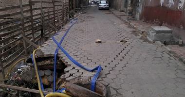 هبوط أرضى أسفل عمارتين بمساكن الأولى بالرعاية بأسيوط