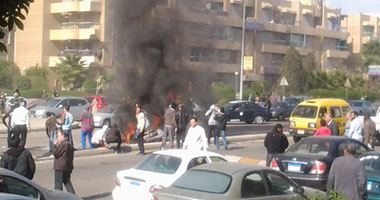 عناصر "الإرهابية" بأكتوبر يشعلون النار فى صناديق سيارات الشرطة