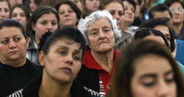 بالصور.. عراقيون يحضرون قداس عيد الميلاد بكنيسة السريان فى أربيل