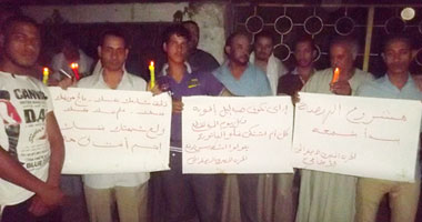 وقفة لـ "المصرى الاجتماعى" بالشموع بسبب انقطاع الكهرباء بأسيوط