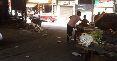 قارئ ينتقد عشوائية الباعة الجائلين أسفل كوبرى الدقى ويطالب بنقلهم