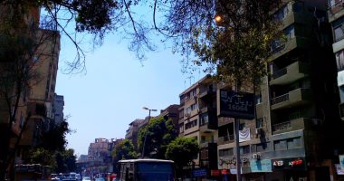 بالصور.. أعمدة إنارة مضاءة نهارا بشارع السودان فى المهندسين