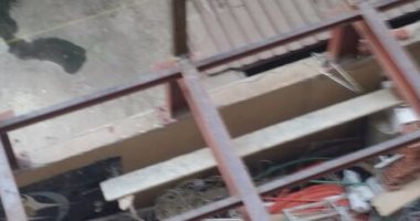 صاحب عقار بالدقى يستغل الممرات الجانبية بين عقارين لبناء أدوار مخالفة