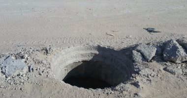 أهالى حدائق أكتوبر يستغيثون من البالوعات المفتوحة وعدم إضاءة الطريق