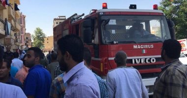 بالصور.. السيطرة على حريق محدود فى بوكس كهرباء أمام أحد البنوك بالعوامية