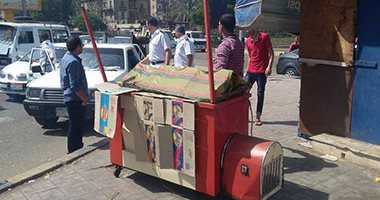 حملة مكبرة بميدان الجيزة والشوارع الجانبية المحيطة به لرفع الإشغالات