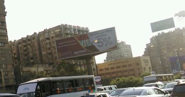 بالفيديو والصور..  إضاءة أعمدة الكهرباء نهارا أعلى كوبرى أكتوبر
