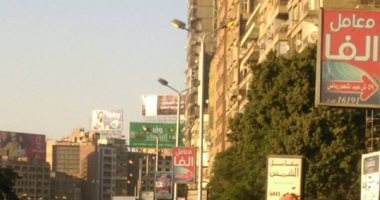 قارئ يرصد إضاءة أعمدة الكهرباء نهارا فى شارع جامعة الدول بالمهندسين