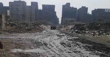بالصور.. شارع جمال عبد الناصر بالحرفيين يغرق فى مياه الصرف الصحى