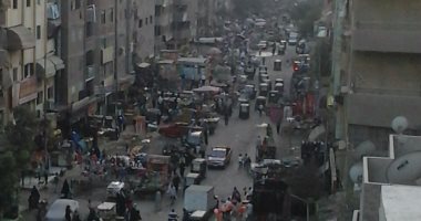 بالصور..شكوى من انتشار الباعة والميكروباصات بشارع مستشفى الصدر بالعمرانية