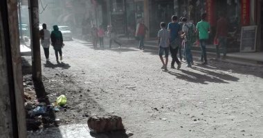 بالصور.. أهالى "دسوق" بكفر الشيخ يطالبون برصف طريق "الشهيد المغربى" 