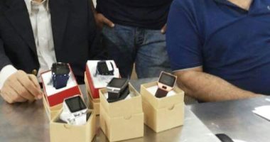 ضبط ٩ ساعات تجسس داخل طردين صينيين بقرية البضائع فى المطار