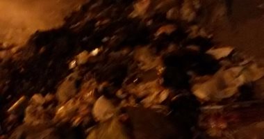 أهالى الطريق الأبيض بأرض اللواء يشتكون من انتشار مخازن القمامة