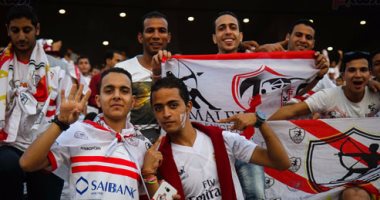 بالصور.. أعلام مصر على كراسى برج العرب.. والشاشة الرئيسية تحمس الجماهير بصور اللاعبين