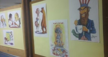 بالصور.. نقابة الصحفيين تنظم معرضا لرسوم الكاريكاتير بعنوان "وسط الزحمة"