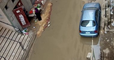بالصور.. أهالى شارع الخليفة بالهرم يشكون من مياه الصرف الصحى