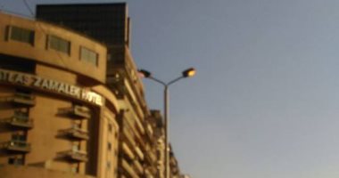 قارئ يشكو من إضاءة أعمدة الإنارة نهارا بشارع جامعة الدول العربية فى المهندسين