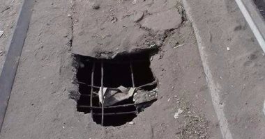 بالصور.. تشققات بأرضية كوبرى قرية "شنوان" تنذر بكارثة