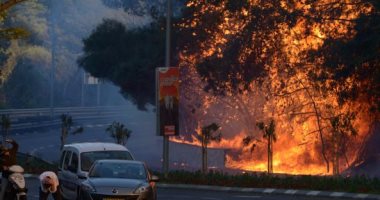 بالصور.. إخلاء أحياء بالكامل فى حيفا بسبب حرائق إسرائيل.. وفتح مراكز الإيواء