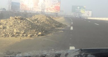 المرور ينتهى من أعمال إصلاح حفر أعلى الطريق الدائرى اتجاه المنيب
