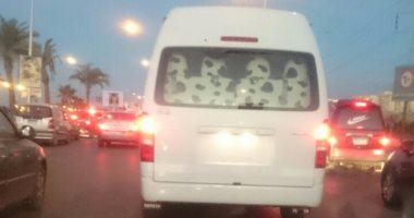 قارئ يرصد سيارة ميكروباص تسير بدون لوحات معدنية فى الشيخ زايد