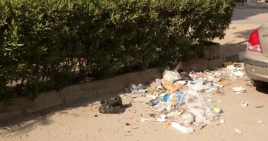 بالصور.. تجمع القمامة بمساكن زهراء مدينة نصر أزمة يعانى منها المواطنون