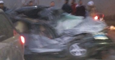 بالصور.. تفحم سيارة بعد اصطدامها بأتوبيس على امتداد كوبرى عرابى بالجيزة