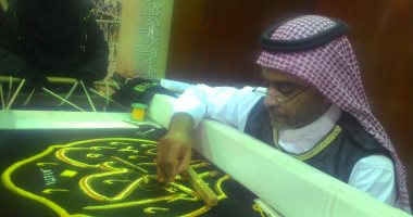 بالصور.. اشرب ماء زمزم والمس كسوة الكعبة فى معرض الكتاب