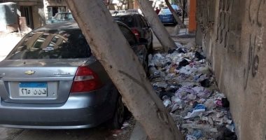 قارئ يشكو تراكم القمامة فى أحد الشوارع بحى البساتين 