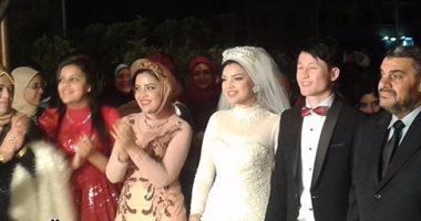 والد وشقيق فتاة تزوجت من صينى: للعروسين الحرية فى اختيار بلد المعيشة