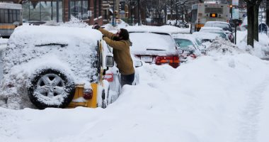بالصور.. عاصفة ثلجية تجتاح عدة ولايات أمريكية