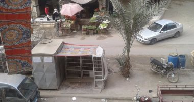 بالصور.. أهالى ترعة عبد العال بفيصل يشكون افتراش الباعة وسرقة الكهرباء