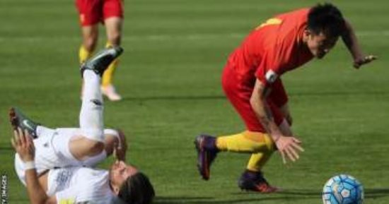 زوجة مدافع الصين: علاقاته النسائية سبب خسارة المنتخب أمام إيران
