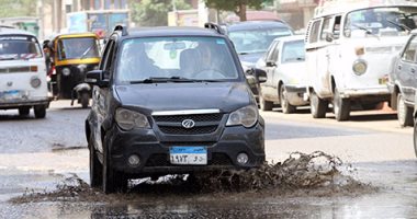شوارع القاهرة والجيزة تغرق فى مياه الأمطار وارتباك فى حركة المرور