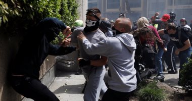 بالصور.. اشتباكات بين معارضى ومؤيدى ترامب فى مظاهرة تطالب بالكشف عن سجله الضريبى