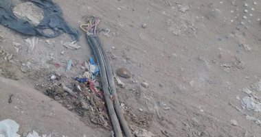 كابلات كهرباء عارية وقمامة تهدد أهالى كعبيش فى الطوابق فيصل