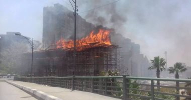 بدء عمليات التبريد لحريق محور روض الفرج الجديد منعا لتجدد اشتعال النيران  