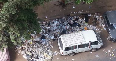 بالصور.. قارئ يرصد تراكم القمامة بشارع أحمد عرابى فى المهندسين