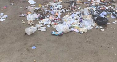 قارئ يشكو من تراكم القمامة فى محطة مشعل بشارع الهرم