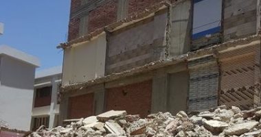 بالصور ..عقارات مخالفة بشارع حسن حفنى بحدائق القبة تنذر بكارثة جديدة