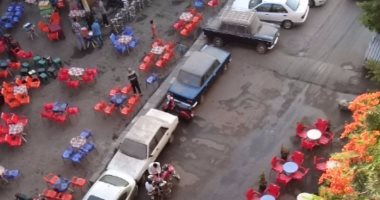 بالصور.. قارئ يشكو انتشار القهاوى والورش أسفل العقارات بالعجوزة