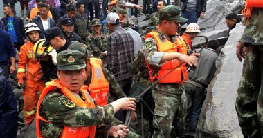 بالصور.. انهيار أرضى يتسبب فى دفن أكثر من 100 شخص أحياء جنوب غرب الصين